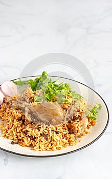 One Pot Indian Chicken and Rice Dish Directly Above Vertical Photo