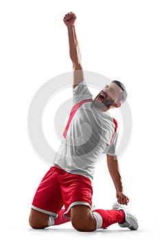 One professional soccer player celebrate victory. Happy celebration. Isolated on white background photo