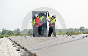 One professional technician worker stand and point to problem area and discuss with co-worker in area of base over water reservoir