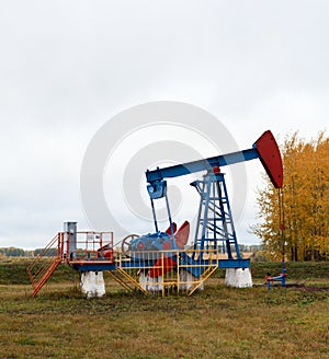 One pump jacks on a oil field.