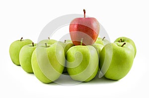 One red apple on green apples