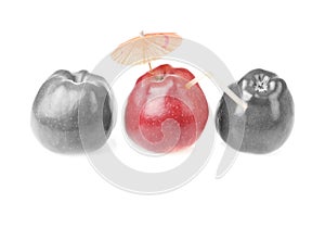 One red apples and two colourless apples photo