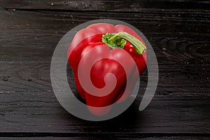 One red christmas ball on white snow