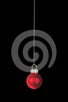 One red Christmas tree ball, isolated