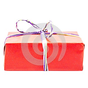 One red gift box with shiny ribbon