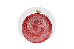 One red glittered Christmas tree ball isolated on white background