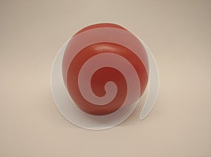One red pomedor  tomato vegetable