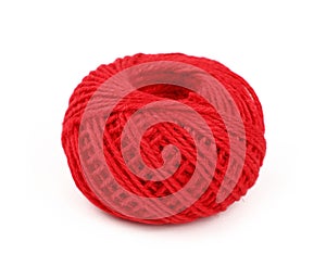 One red twine jute coil bobbin isolated on white