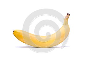 One ripe yellow banana isolated on a white background