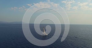 One Sailboat Cruising at Mediterranean Sea