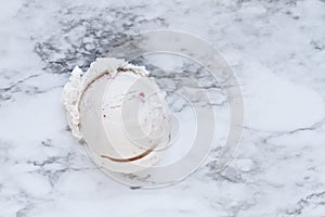 One Scoop of Strawberry Ice Cream over Marble Background