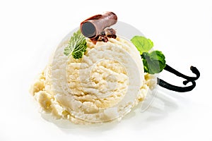 One scoop of vanilla gelato on a white background