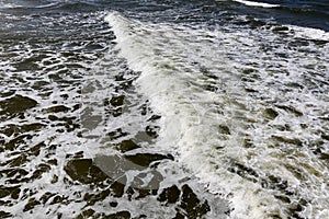 One sea wave on a water surface