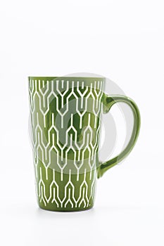 One shabby green cup isolated on a white background