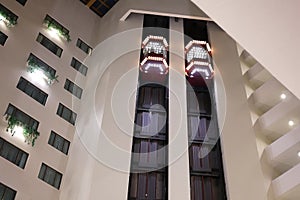 One side of people taking elevator inside the shopping mall