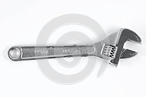 One silver Wrench isolated on a white