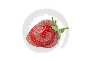 One single big ripe red strawberries laying on isolated white background