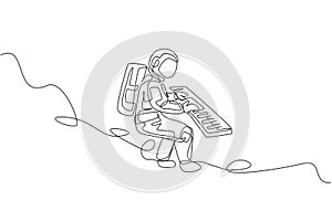 One single line drawing of spaceman playing keyboard musical instrument in deep space graphic vector illustration. Music concert