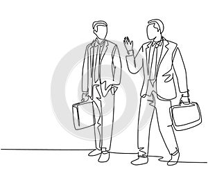 One single line drawing of two young company manager take a walk and talk together after office hour. Business conversation
