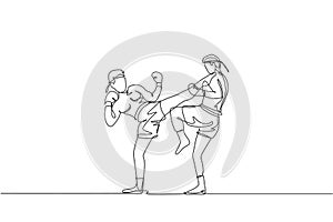 One single line drawing of two young energetic muay thai fighter men train to duel at gym fitness center vector illustration.