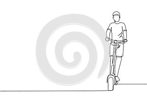 One single line drawing of young energetic man riding electric scooter at city park vector graphic illustration. Future transport