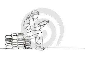 One single line drawing of young happy male muslim businessman reading a book above pile of books. Saudi Arabia cloth shmag