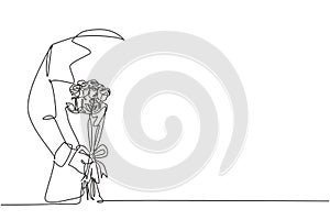 One single line drawing of young happy man hiding bouquet of beautiful rose flowers as a gift on his back. Greeting card,