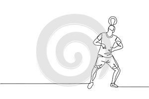 One single line drawing of young happy man perform soccer freestyle, keep the ball on head at the city square vector illustration