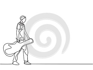 One single line drawing of young male guitarist walking while carrying acoustic guitar leather case on his hand. Musician artist