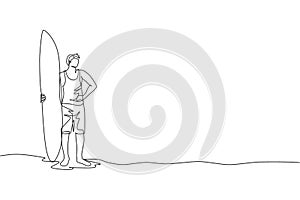 One single line drawing of young sporty surfer man standing and holding long surfing board at sandy beach graphic vector