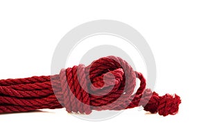 One skein of jute rope six millimeters for Japanese bondage and shibari, painted in red on a white background