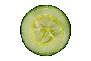 One slice of green fresh cucumber vegetable, , concept of healthy eating, veganism