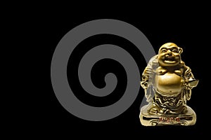 One small golden figurine of buddha
