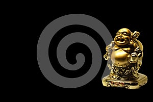 One small golden figurine of buddha