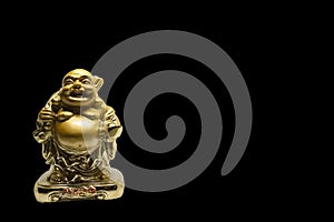 One small golden figurine of buddha