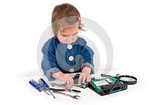 One small little girl fixing router or modem or PCB.