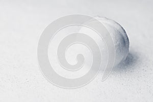 One snowball on white background