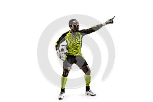 One soccer player goalkeeper isolated on white background