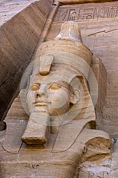 One of the statues of Ramses II at the magnificent ruins of the Great Temple of Ramses II at Abu Simbel in Egypt. photo