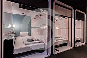 One-story bedroom area is combined inside a modern capsule hotel