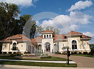 One Story Stucco Residential Home With Clay Tile R