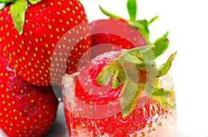 One strawberry into ice