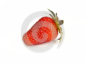 One strawberry isolated on white background. Red fruit
