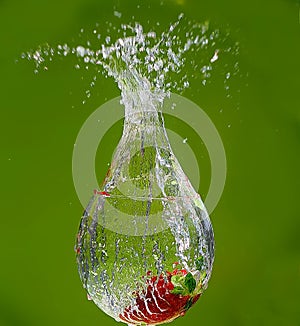 One strawberry in the water