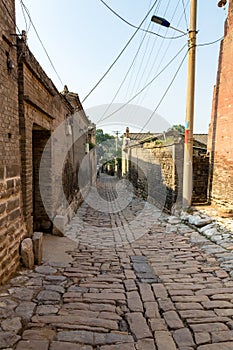 One of the streets of the village of Zhangbi Cun, near Pingyao, China, famous for it`s underground fortress