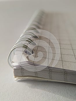 Spiral notebook on white background