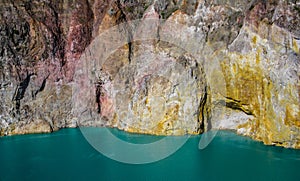 Mt Kelimutu`s volcanic lakes and colored rock faces. flores, Indonesia photo