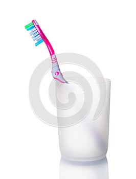 One toothbrushe in a glass