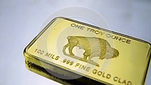 One troy ounce gold bar with BUFFALO stamped engraved