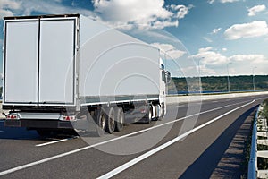 One truck with container on road, cargo transportation and shipping concept